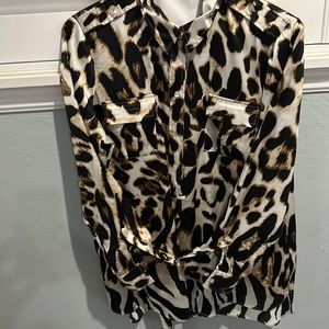 Chicos woman’s Animal print silky shirt.